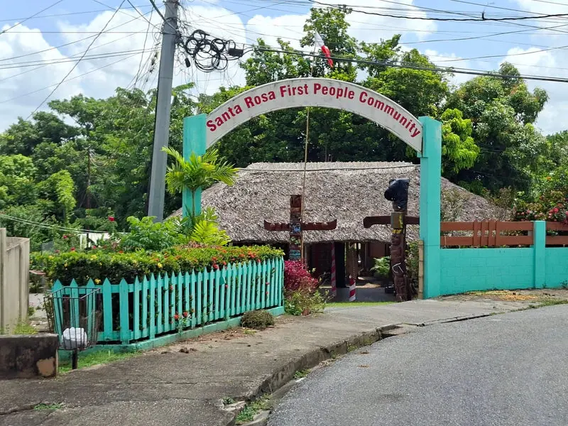 The turquoise entrance arch of the Santa Rosa First Peoples Community